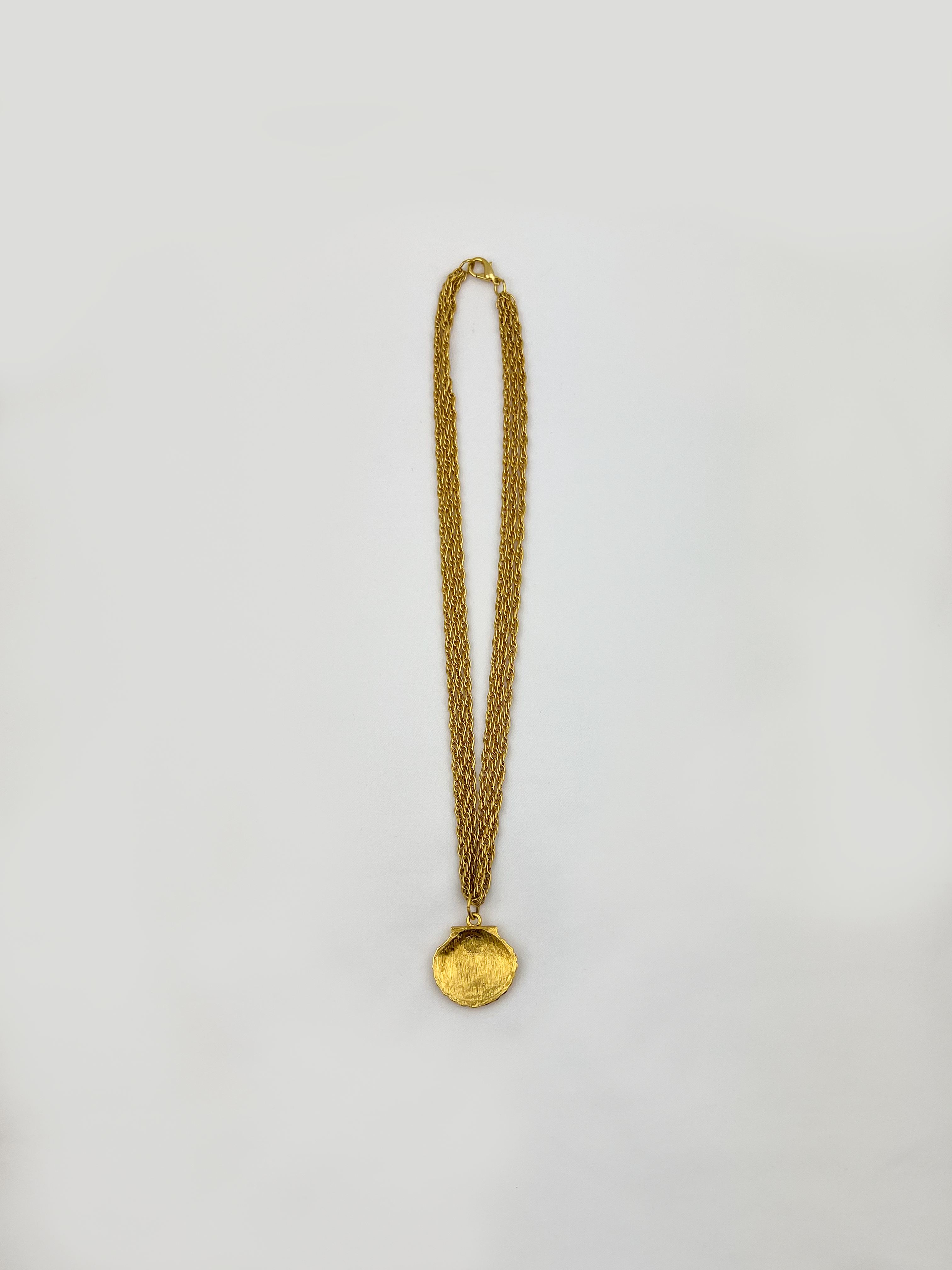 Triple Strand Shell Pendant Necklace